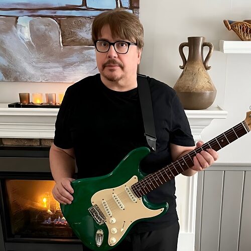 Former Ronnie Hawkins’ The Hawks Bassist KC ARMSTRONG Scales Global Charts with Powerful New Single “Mountain Man”